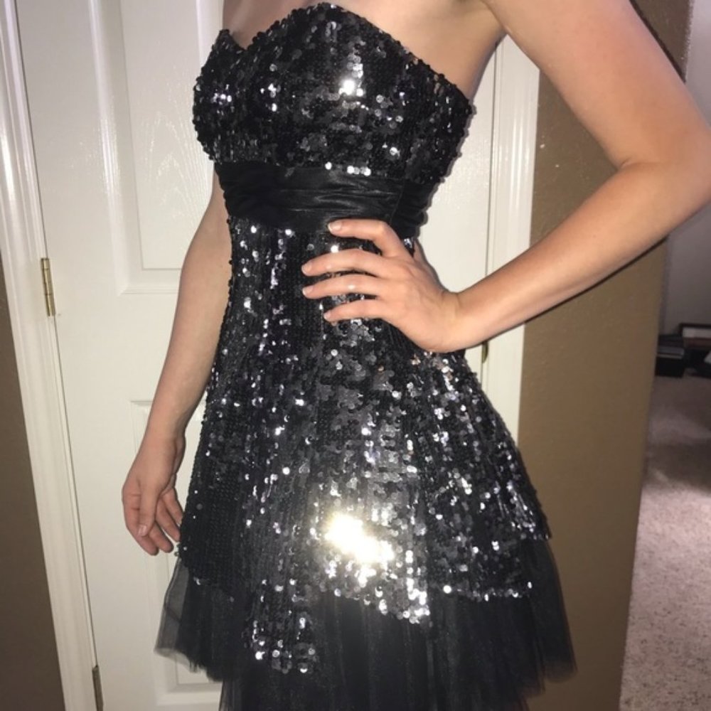 Beautiful strapless sequined black & silver prom dress from Deb.  Size 9-10.